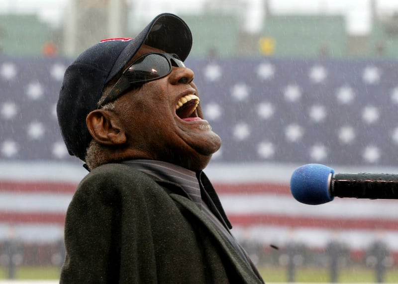 Ray Charles sings America The Beautiful in the rain at Fenway Park in Boston in 2003