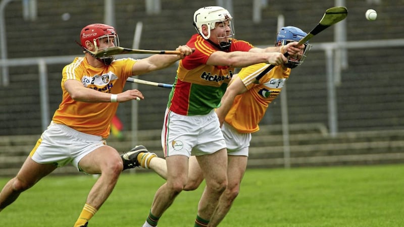 Carlow&#39;s Martin Kavanagh comes under pressure from Antrim&#39;s Simon McCrory and John Dillon in April&#39;s Christy Ring meeting 