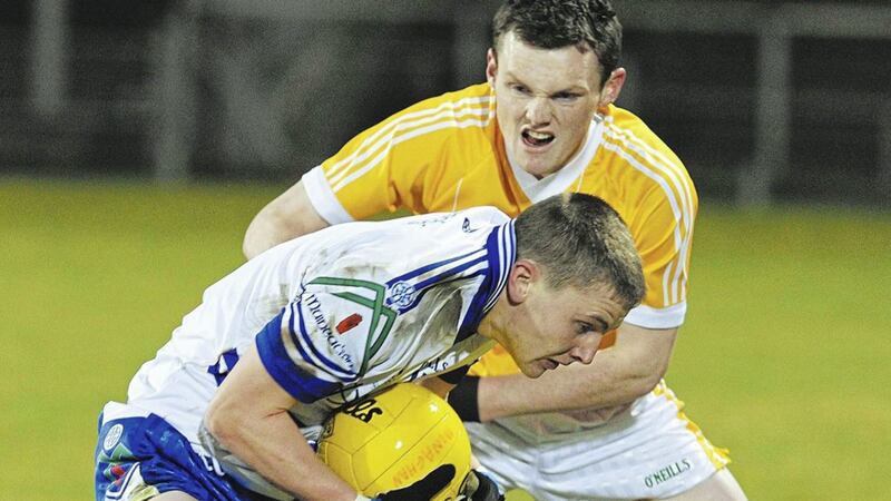 Antrim&rsquo;s James Lavery closes in on Monaghan&rsquo;s Dermot Malone during the Ulster Under 21 Football Championship quarter-final at Casement Park, Belfast on Wednesday March 24 2010. Picture by Declan Roughan. 