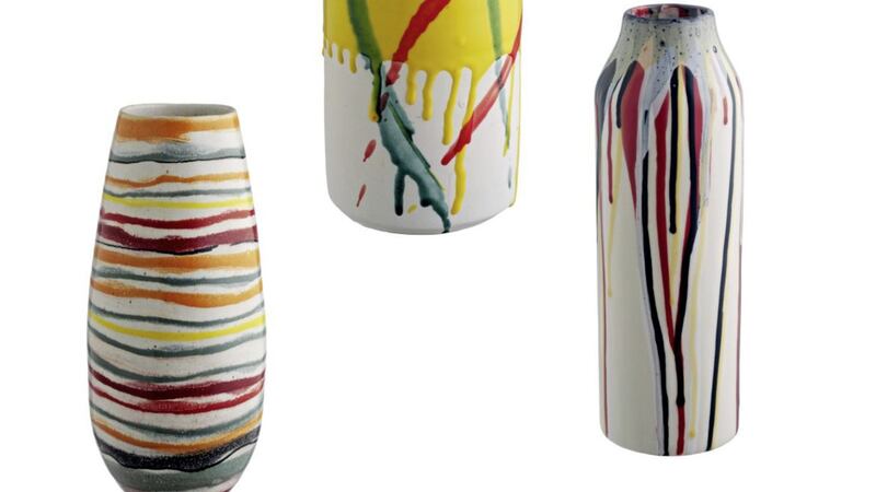 Wave multi-coloured stripe ceramic vase, &pound;35, Rezzo yellow small patterned vase, &pound;30, and Fenick multi-coloured tall vase, &pound;20, all available at Habitat 