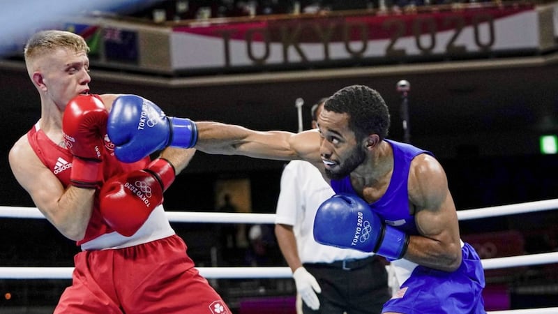 Duke Ragan, of the United States, right, punches Ireland's Kurt Walker during their men's featherweight 57-kg boxing match at the Tokyo 2020 Olympics, on Sunday&nbsp; &nbsp; &nbsp; &nbsp; &nbsp; &nbsp; &nbsp; &nbsp;Picture: AP Photo/Themba Hadebe