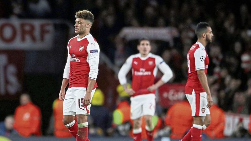 Arsenal&#39;s Alex Oxlade-Chamberlain looks dejected after Arsenal&#39;s heavy defeat to Bayern Munich 