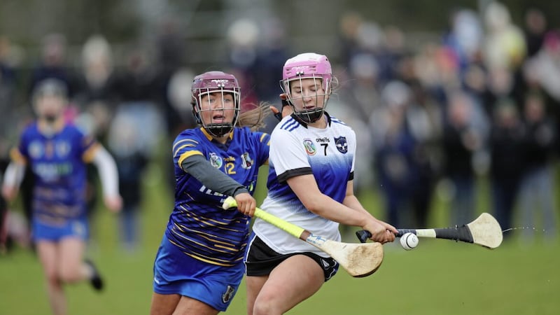 Erin Kelly of St Patrick&#39;s, Maghera gets to the ball ahead of Ellie Jo Butler of St Killian&#39;s, Garron Tower during Sunday&#39;s Corn Uan Uladh final at Picture: Sean Paul McKillop 