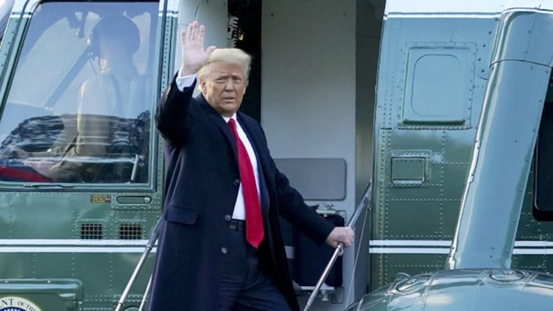 President Donald <span class="red">Trump</span> waves as he boards Marine One on the South Lawn of the White House, Wednesday, January 20, 2021, in Washington. <br /> <span class="red">Trump</span> is en route to his Mar-a-Lago Florida Resort after leaving the White House for the last time as president. Picture by AP /Alex Brandon