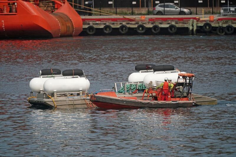 The launch platform used for the Titan submersible is towed at the port of St. John’s in Newfoundland