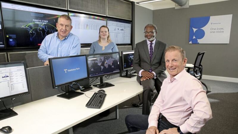 The Telef&oacute;nica Tech UK&amp;I team showcases the expanded security operations centre at its offices in Belfast. From left - Martin Hess, managing director; Shannon Walmsley, SOC team lead; Pete Campbell, head of managed services; and Peter Russell, managing director of Ireland 
