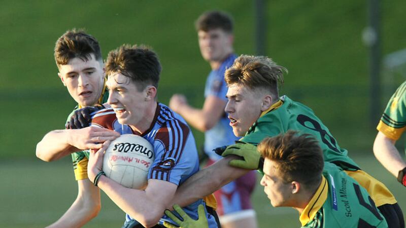 Tiarnan Bogue, St Michaels College, Enniskillen is surrounded by St Mary's CBGS, Belfast players, Colm McLarnon, Declan Smyth and Eoghan McCabe.&nbsp;