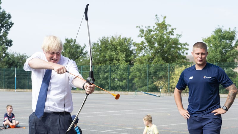 Boris Johnson takes part in archery during a visit to the Premier Education Summer Camp at Sacred Heart of Mary Girl's School, Upminster in Essex. Picture by Lucy Young/Evening Standard/PA Wire&nbsp;