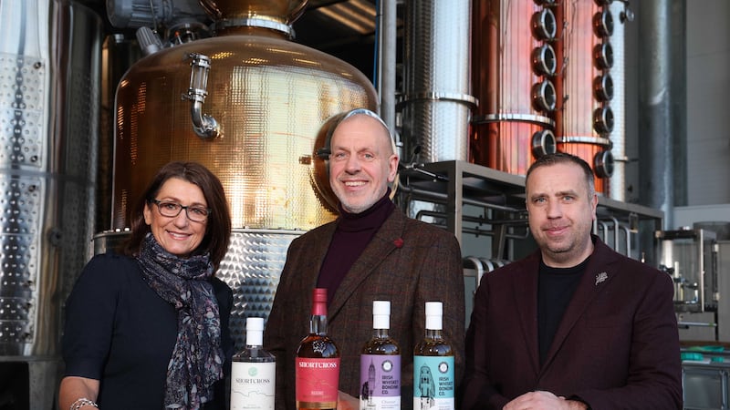 L-R: Fiona Walker, client manager, Invest NI; John Hood, Invest NI’s food and drink director; and David Boyd Armstrong co-founder and head distiller at Rademon Estate Distillery.