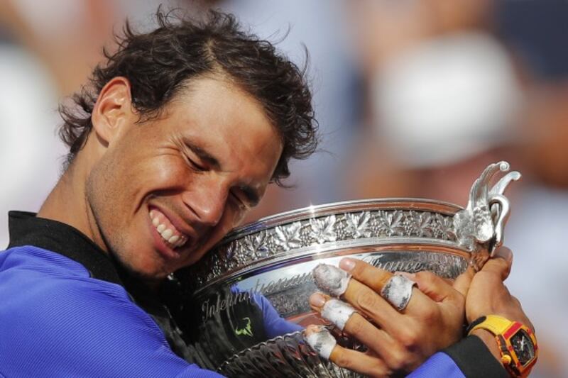Rafael Nadal celebrates winning his 10th French Open title
