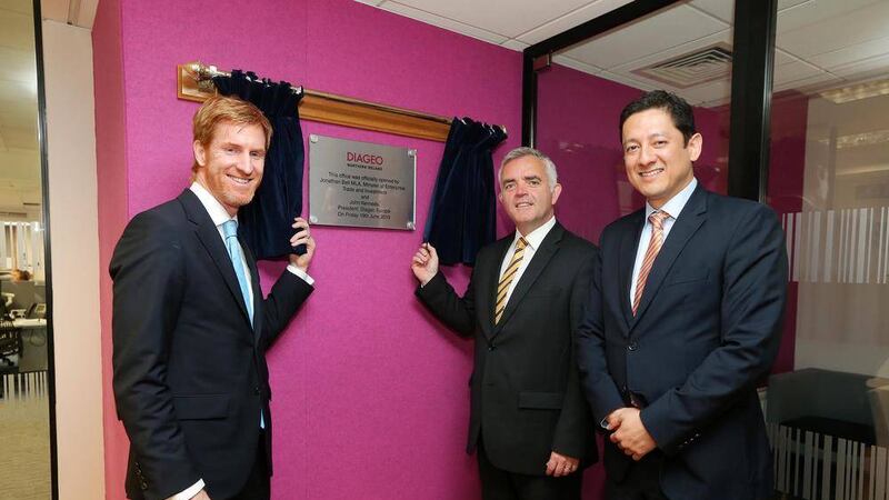 Opening the new Diageo offices are (from left) John Kennedy, president of Diageo Europe, minister Jonathan Bell; and Jorge Lopes, Diageo country director 