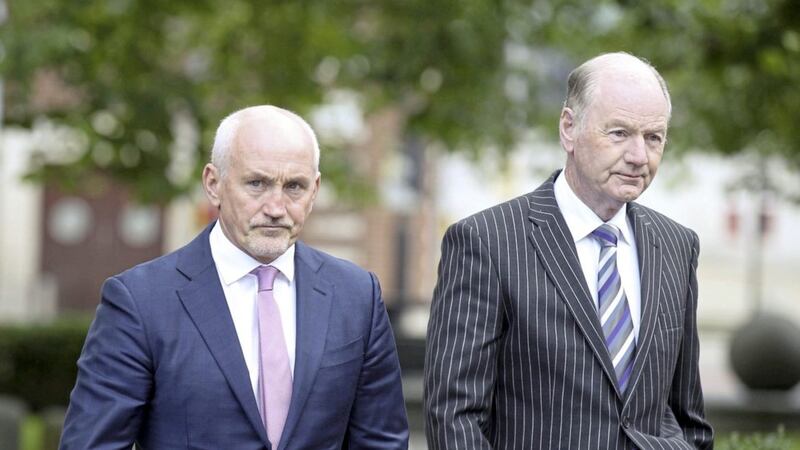 Barry McGuigan left on the way to the High Court in Belfast. Picture by Hugh Russell. 