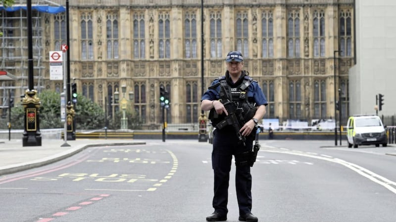Armed police on Victoria Embankment in Westminster, central London, on August 14 after a car drove into a security barrier outside the Houses of Parliament. Picture by Stefan Rousseau/PA