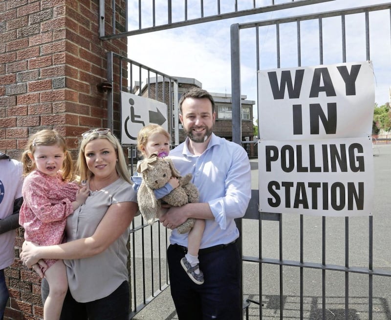 SDLP leader Colum Eastwood together with his wife Rachael and children Rosa and Maya at the European election polling station in Derry where he voted on Thursday of last week. Picture by Margaret McLaughlin 