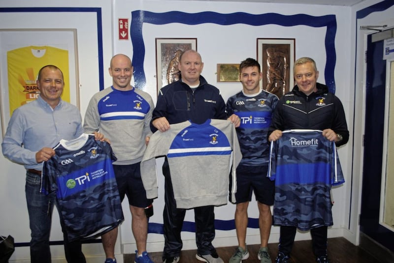 St John&rsquo;s, Belfast recently received new jerseys from sponsors TPI and Homefit for their hurling and football teams. Pictured with the jerseys are Colin Thompson (TPI), Colm McFall (senior hurling captain), Donal Gallagher (Trust Ford), Patrick McBride (senior football captain) and John Kelly (Homefit) 