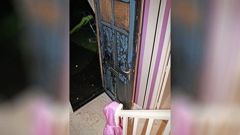 The front door of the house in St Gall&#39;s Avenue was badly scorched in the attack on Tuesday. Picture by Bill Smyth 