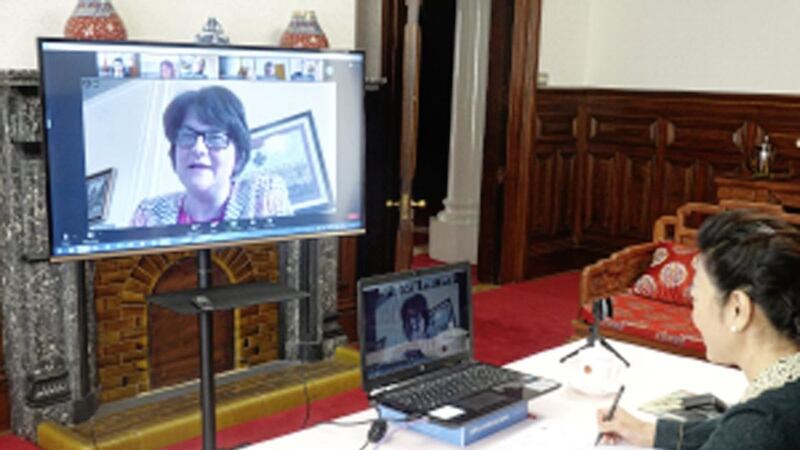 First Minister Arlene Foster speaking in a video call to Belfast&#39;s Chinese Consul General Madame Zhang Meifang 