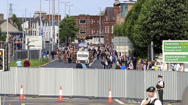 Workmen put up barriers where the Somme parade passes Short Strand in east Belfast. Picture by Cliff Donaldson 