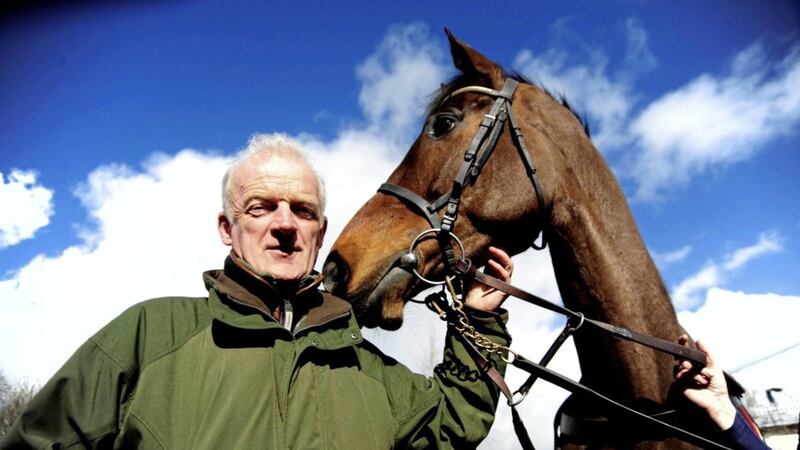 Trainer Willie Mullins and Douvan pose for a picture during a visit to his stables at Closutton, Carlow 