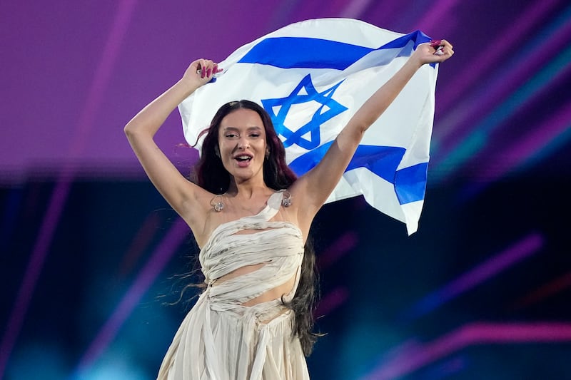 Eden Golan of Israel enters the arena during the flag parade before the Grand Final of the Eurovision Song Contest in Malmo, Sweden (Martin Meissner/AP)