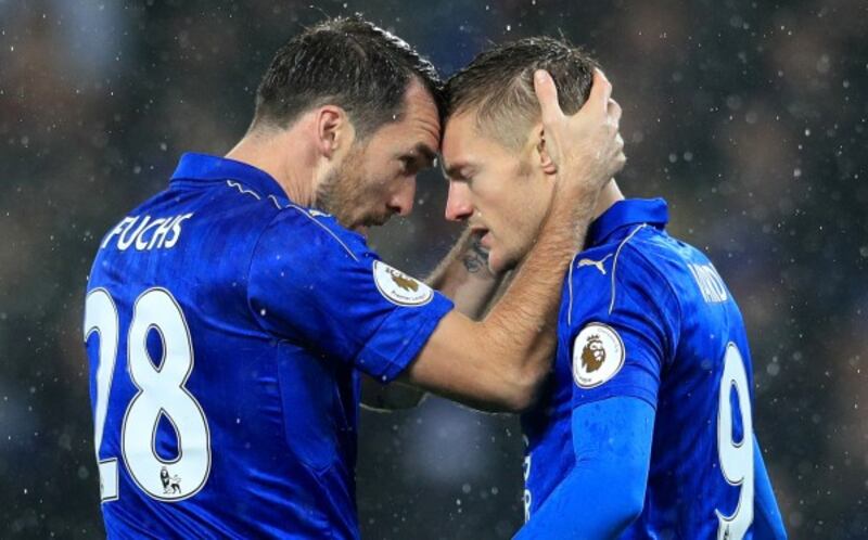 Christian Fuchs and Jamie Vardy celebrate a Leicester goal