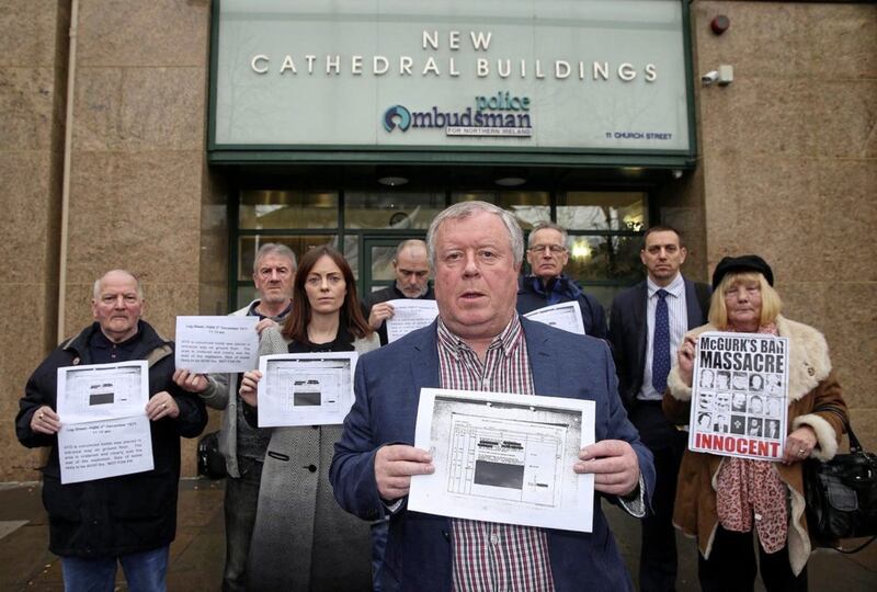 Robert McClenaghan (centre), whose grandfather was killed in the McGurks Bar bombing, along with members of the families of the victims of the with Nichola Mallon MLA and Gerry Kelly MLA outside the Police Ombudsman Office in Belfast. Picture Mal McCann.