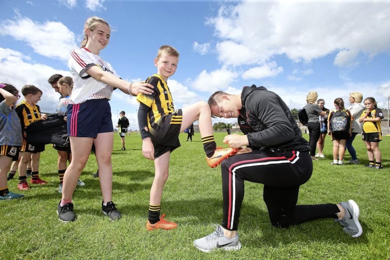 Kieran McGeary signs autographs for Tyrone supporters in Pomeroy. Picture by Mal McCann 