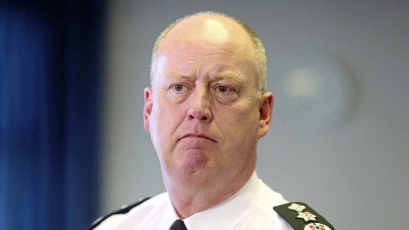 PSNI Chief Constable George Hamilton is challenging a finding that police officers and civilian workers are owed money dating back two decades 