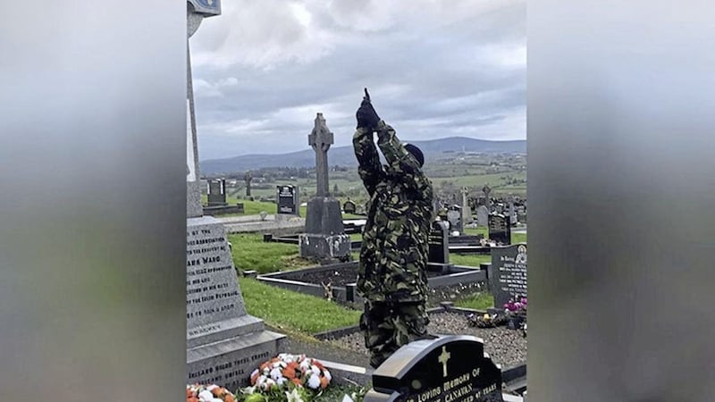 A masked Continuity IRA member fires shots at a graveyard in Carrickmore, Co Tyrone, last Easter 