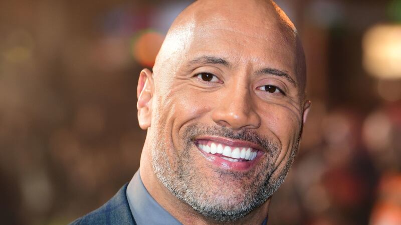 The Rock surprised personal trainer Oscar Rodriguez at a special screening of his new film, Red Notice, and got him up on stage to chat.