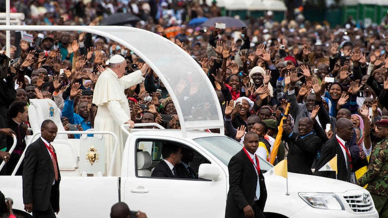 VISIT: Pope Francis waves as he arrives to celebrate a Mass at the campus of the University of Nairobi, Kenya, yesterday  PICTURE: (L&#39;Osservatore Romano/Pool Photo via AP) 