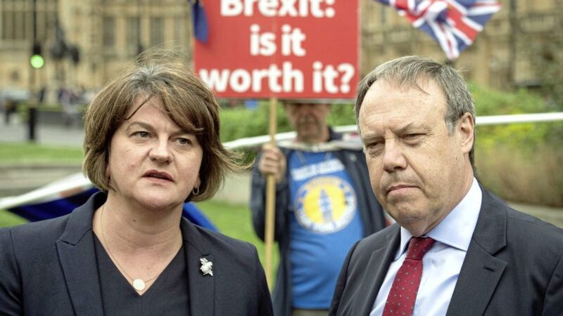 DUP leader Arlene Foster and deputy leader Nigel Dodds surrounded by anti-Brexiteers in Westminster in September