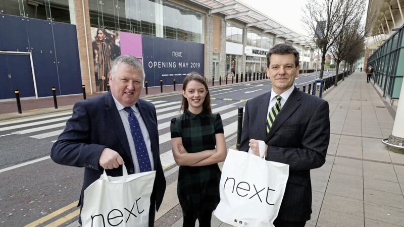 Pictured outside Next&rsquo;s new store in Newry is CBRE&#39;s Colin Mathewson with Cathal Austin and Katie Mulligan of The Quays 
