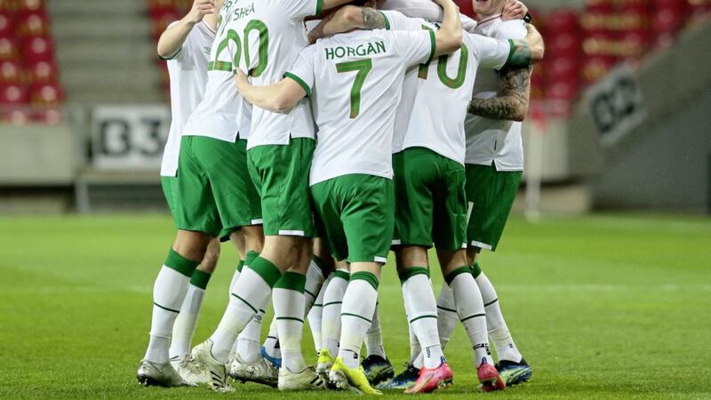 Republic of Ireland&#39;s James McClean (right) celebrates scoring their side&#39;s goal against Qatar, on the Derryman&#39;s 80th international appearance 