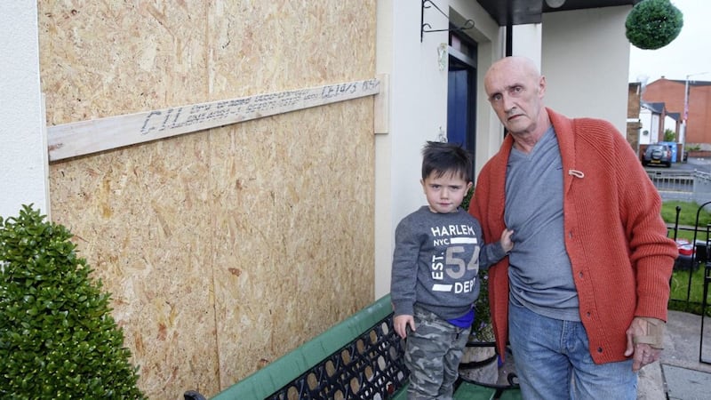 James Murtagh and his young son Morgan (4) outside their home in Ravenhill Avenue in east Belfast. Picture by Mal McCann.