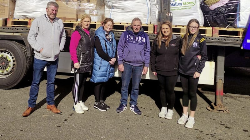 John Hurson (left) pictured with volunteers in Pomeroy before three lorry loads of Ukrainian aid left the village for Poland at the weekend 