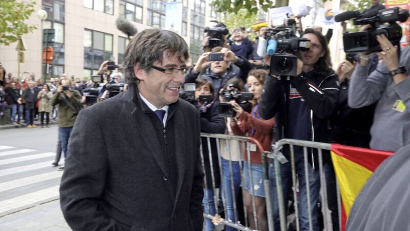 Sacked Catalonian president Carles Puigdemont arrives for a press conference in Brussels PICTURE: Olivier Matthys/AP 