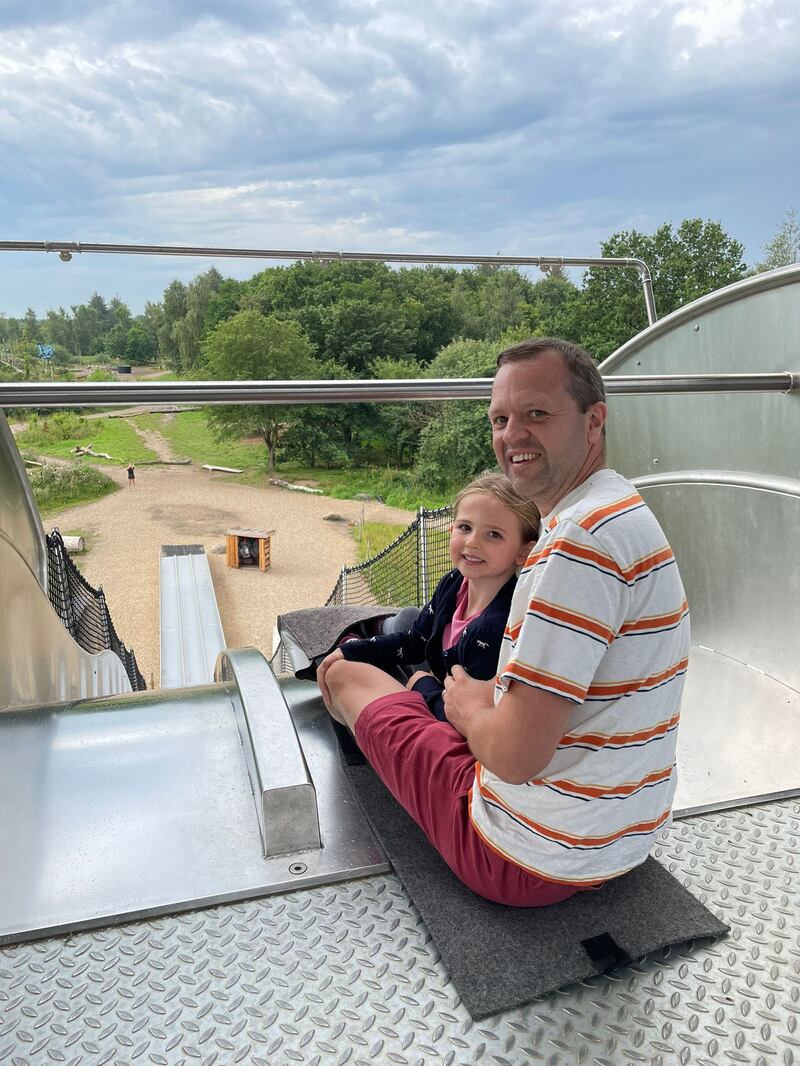 Wesley Johnson and his six-year-old daughter Evie on The Giant’s Forest Racer slide in the Wow Park, Billund.