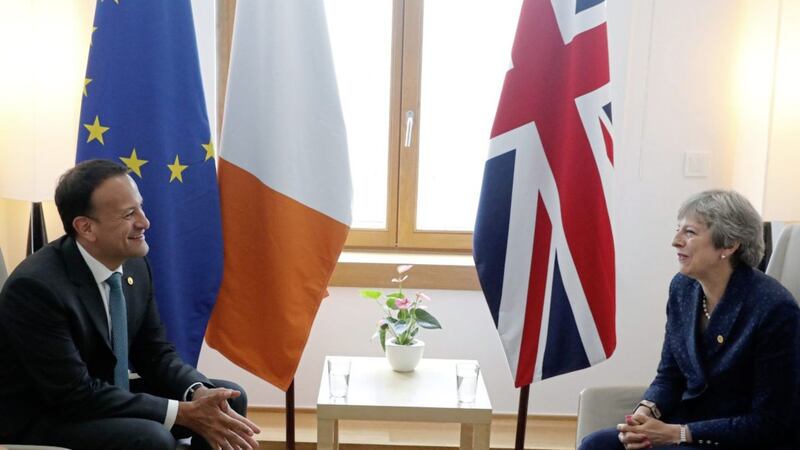 Leo Varadkar and Theresa May. Mrs May has likened any move that would see Northern Ireland&#39;s regulations differ from the rest of the UK&#39;s, to putting a border in the Irish Sea 