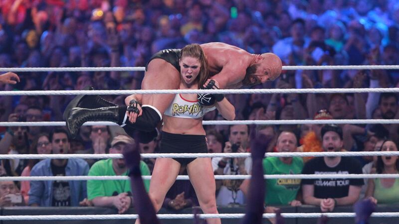 The former UFC star teamed up with Kurt Angle to defeat Stephanie McMahon and Triple H.