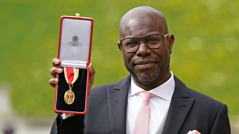 The Oscar-winning filmmaker and artist, who directed 12 Years A Slave, was given his knighthood by the Princess Royal.