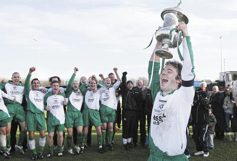 Dundela captain Gary Walker lifts the Steel &amp; Sons Cup in 2007. Under the late Mervyn Bell, the Duns rarely lost Steel finals 
