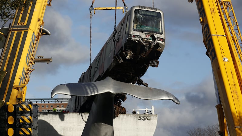 The train had been left precariously balanced on the whale’s tail 10 metres above the ground on Monday.
