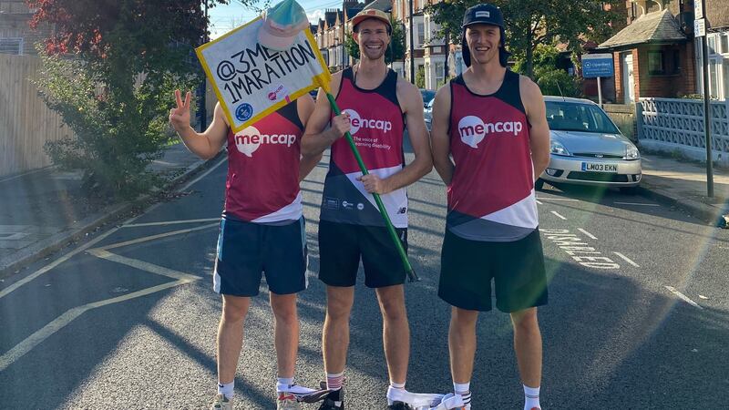 Brothers Michael and Andrew Pelton and their friend Niall Cooper will be tied together at the ankles for Sunday’s run.