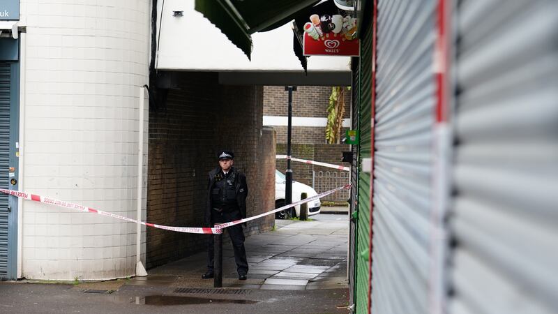 A police officer close to the scene in Bermondsey where Kacey Clarke was fatally stabbed