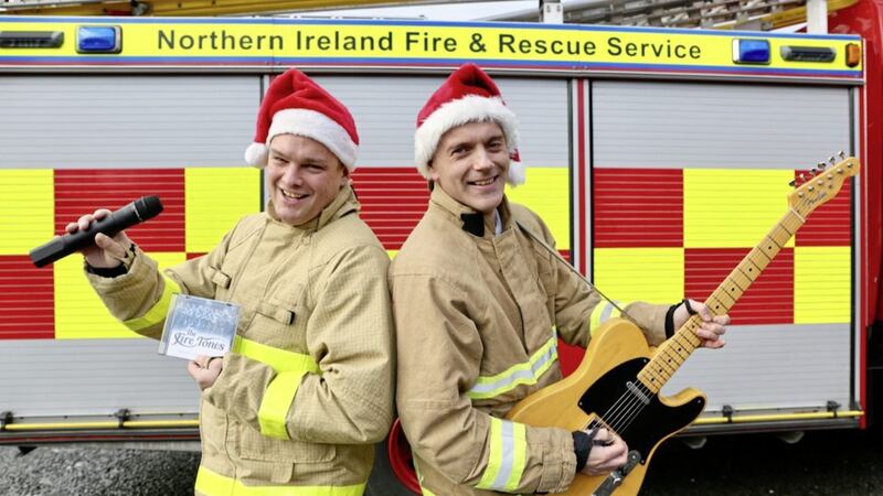 Station Commander Barrie Davies and Assistant Group Commander Patsy Begley, who are members of charity single group The Fire Tones 