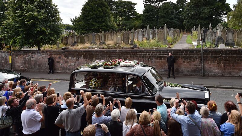 Cilla Black's coffin leaves St Mary's Church in Woolton, Liverpool. Picture: Owen Humphreys/PA &nbsp;