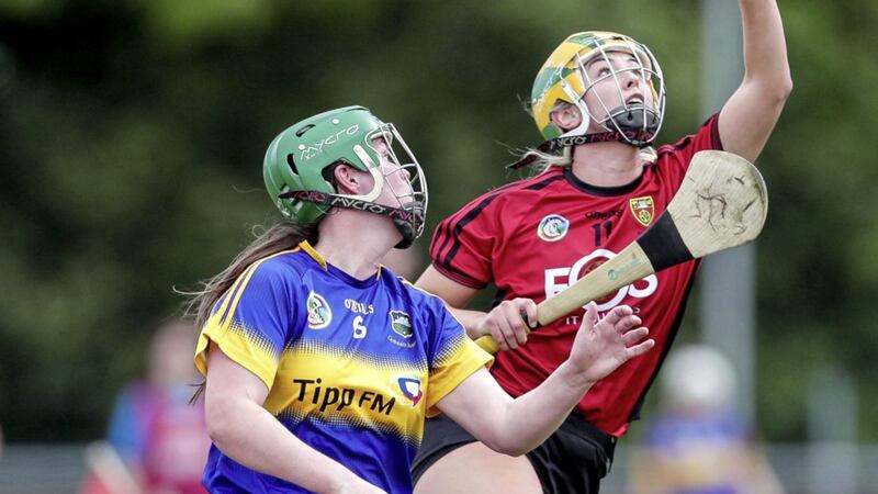 Down&#39;s Aimee McAleenan rises above Hazel McAuliffe of Tipperary in the 2018 Liberty Insurance All-Ireland Intermediate Camogie Championship semi-final, at Coralstown/Kinnegad GAA, in county Westmeath. Picture by INPHO/Laszlo Geczo. 