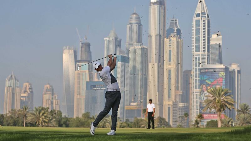 Rory McIlroy plays a shot on the 13th hole during the first round of the Omega Dubai Desert Classic on Thursday<br />Picture by PA&nbsp;