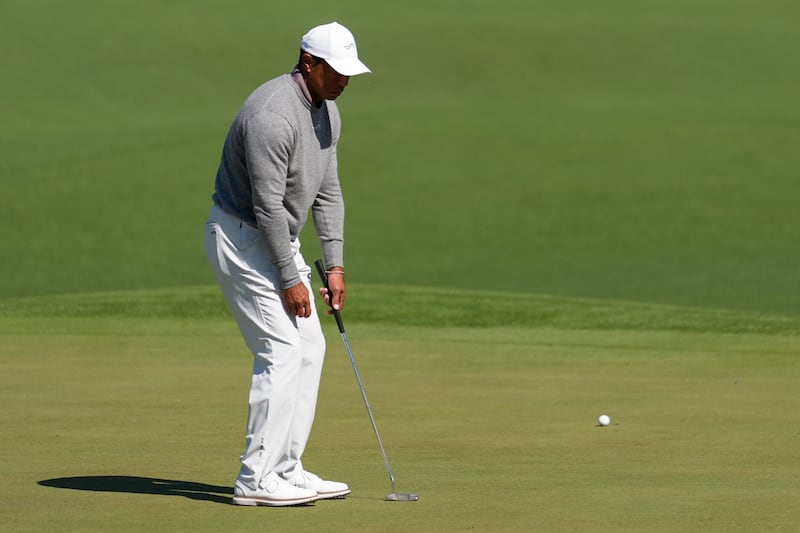 Tiger Woods reacts after missing a putt on the second hole during the second round of the 88th Masters (Ashley Landis/AP)